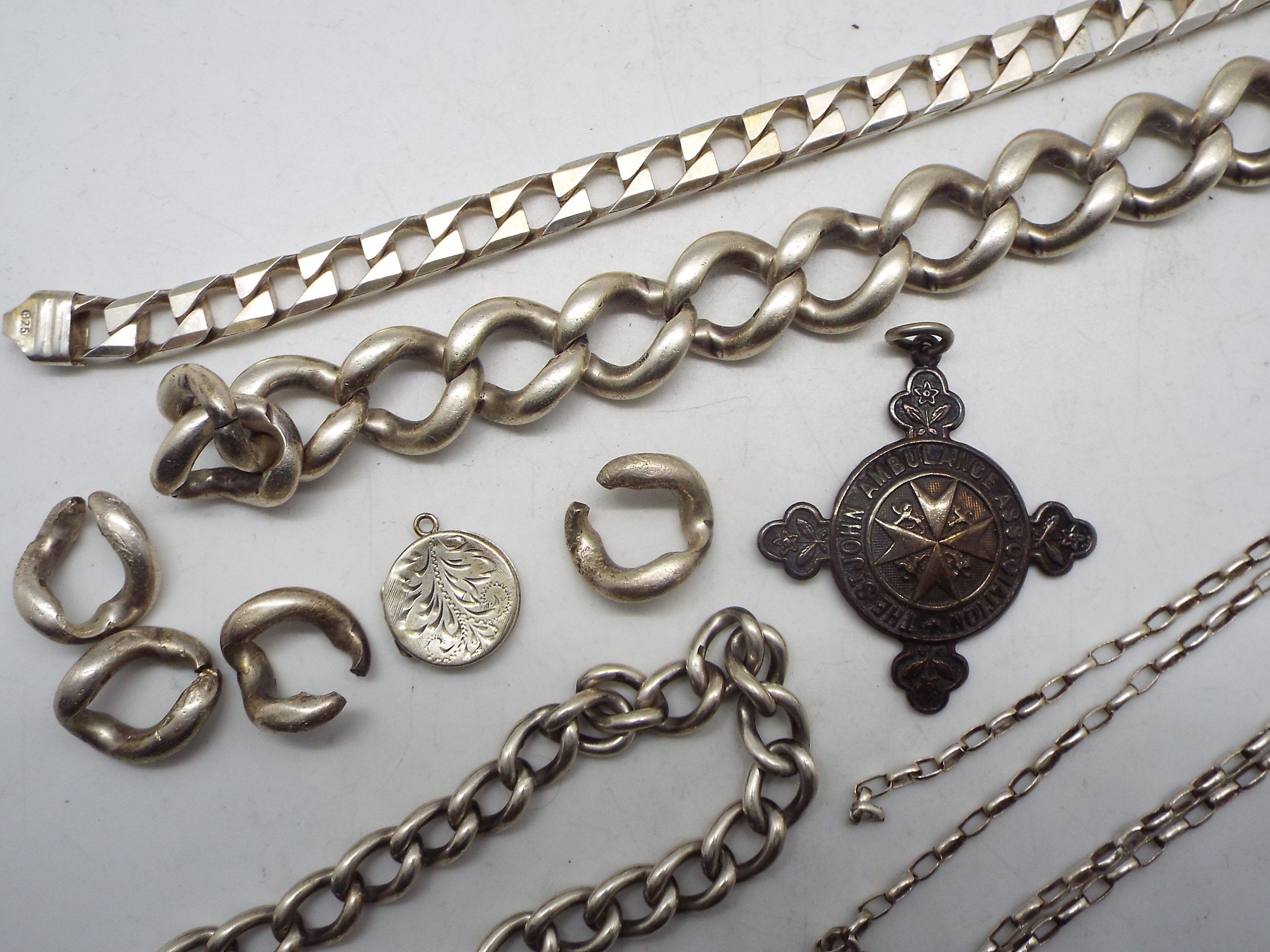 A collection of silver and white metal jewellery to include bracelets (A/F), locket pendant, - Image 3 of 5