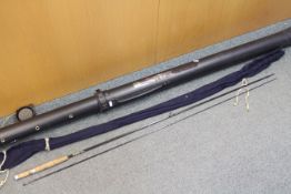 A Hardy Graphite Fly rod, two piece, contained in soft case and tube.