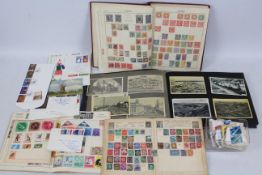 Three albums of world stamps,