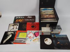 A quantity of 7" vinyl records to include Kraftwerk, The Jam, Queen, Culture Club,