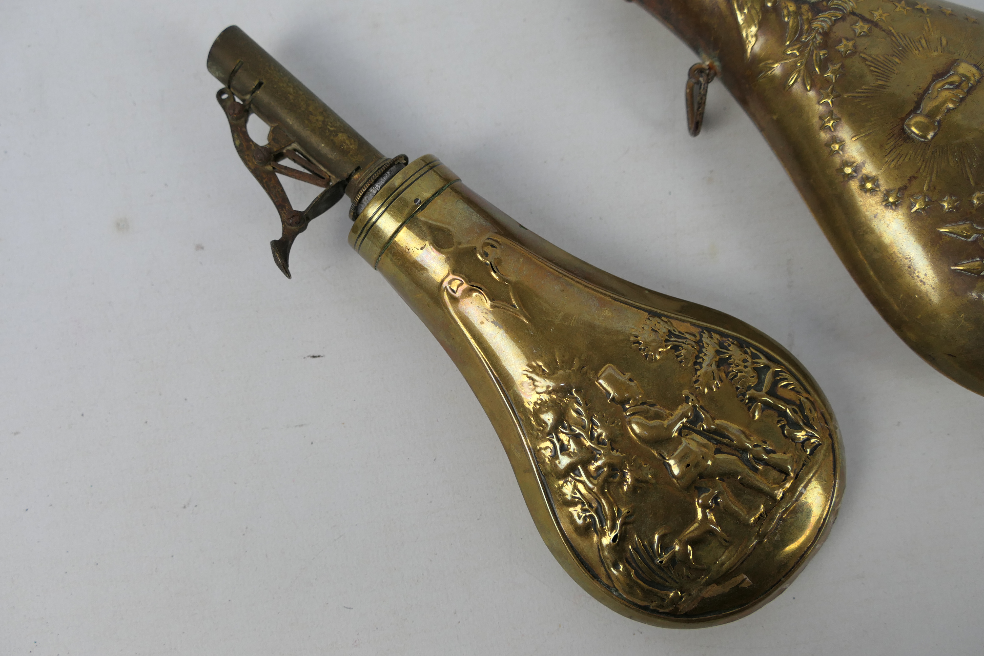 Two brass powder flasks one embossed with hunting scene and a US Model 1855 Peace or Zouave type. - Image 4 of 7