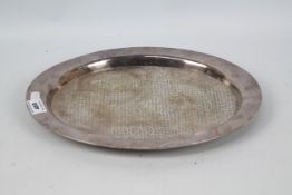 A Korean dish or tray with textured interior, marked to the base Made In Korea 99% Silver,