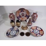 A collection of Oriental and similar ceramics to include vases, plates and similar.