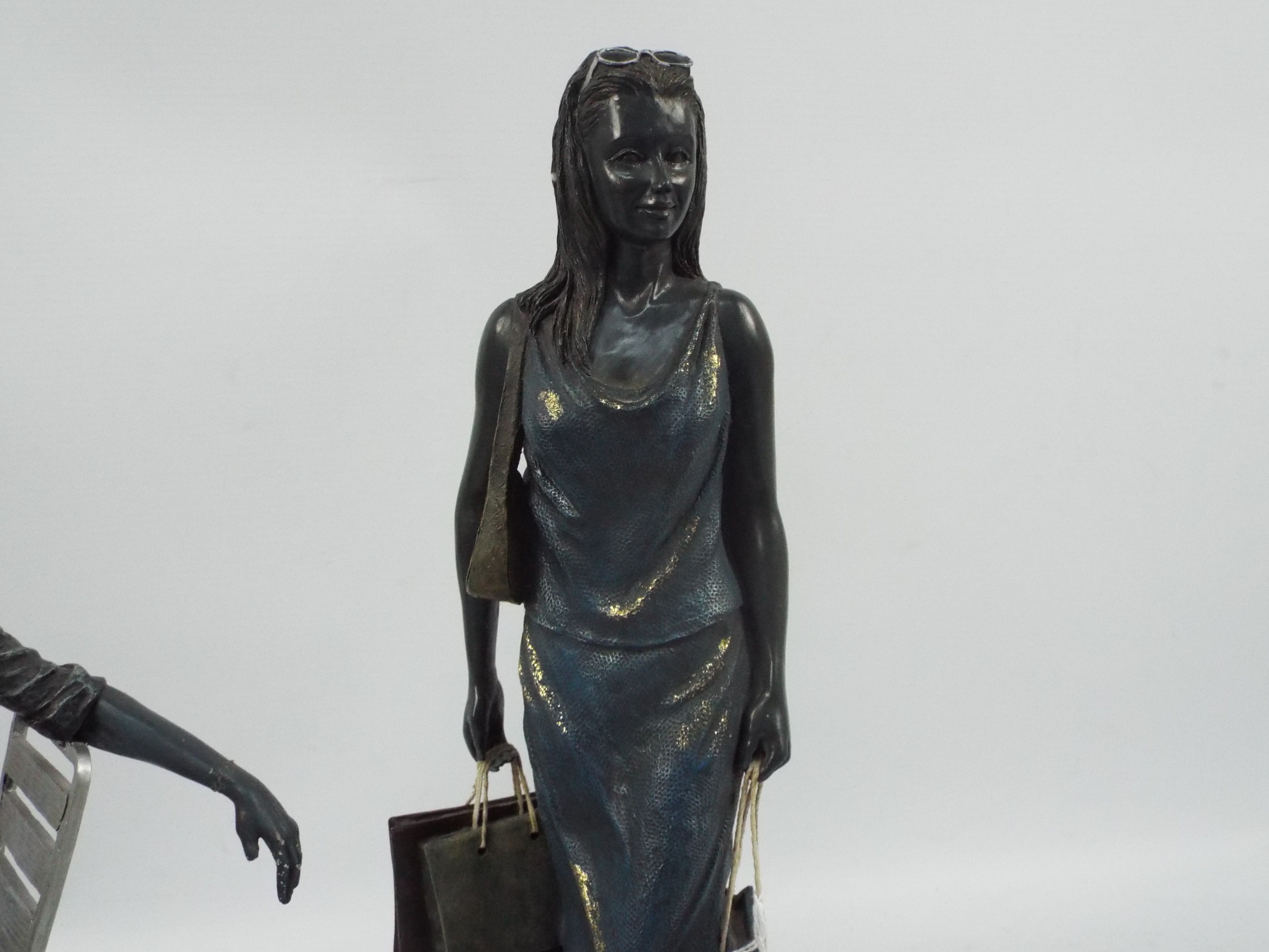 Two Enesco Galley figures from the Piazza series comprising Woman Shopping and Woman At Table, - Image 3 of 4