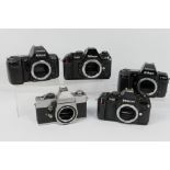 Photography - Four Nikon camera bodies comprising an F801, F501, F801S and F301,