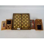 Two vintage chess sets (one lacking a piece) contained in original boxes,