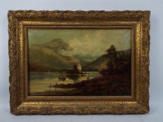 A giltwood framed oil on canvas landscape scene,