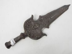 A ceremonial halberd or standard terminal of cast iron construction,