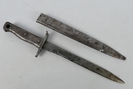A German Ersatz bayonet, 24 cm single edged blade, steel hilt and crossguard stamped 36575,