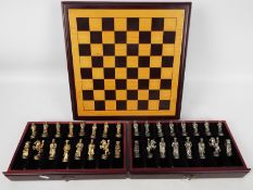 Chess Set - A chess board box with pieces contained in two drawers, king approximately 6 cm (h).