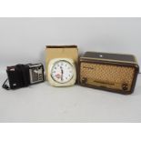 A vintage Champion radio, a further Toshiba radio and a Smiths Sectric wall clock.