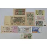 A small collection of banknotes to include Russia, Germany and France.