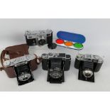 Photography - A collection of cameras to include a Zeiss Ikon Contax II with Carl Zeiss Jena Sonnar