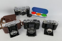 Photography - A collection of cameras to include a Zeiss Ikon Contax II with Carl Zeiss Jena Sonnar