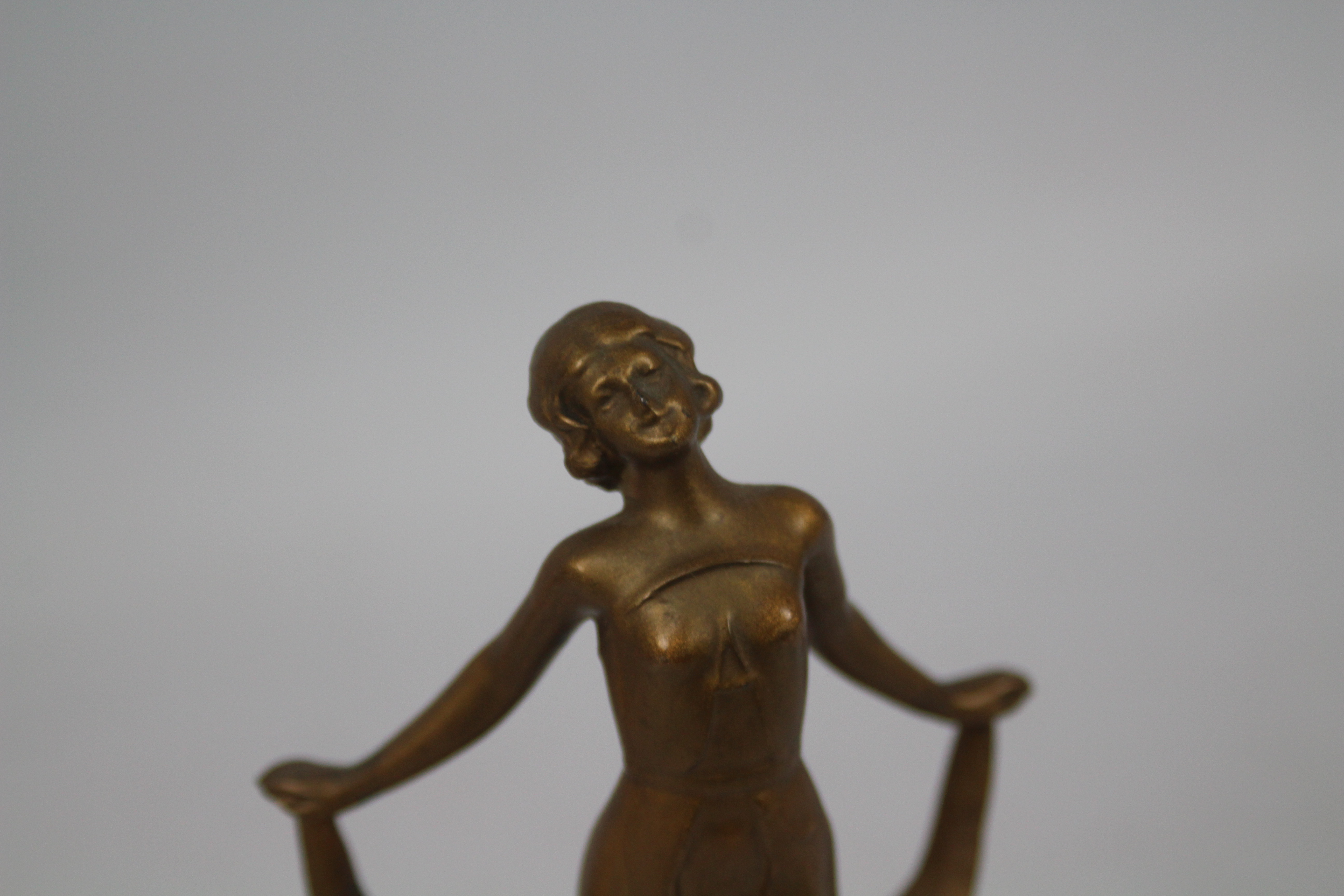 An Art Deco style cast metal and composition figure after Bruno Zach, - Image 9 of 12