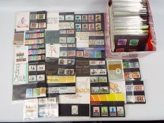 Philately - A collection of predominantly decimal mint stamp presentation packs,
