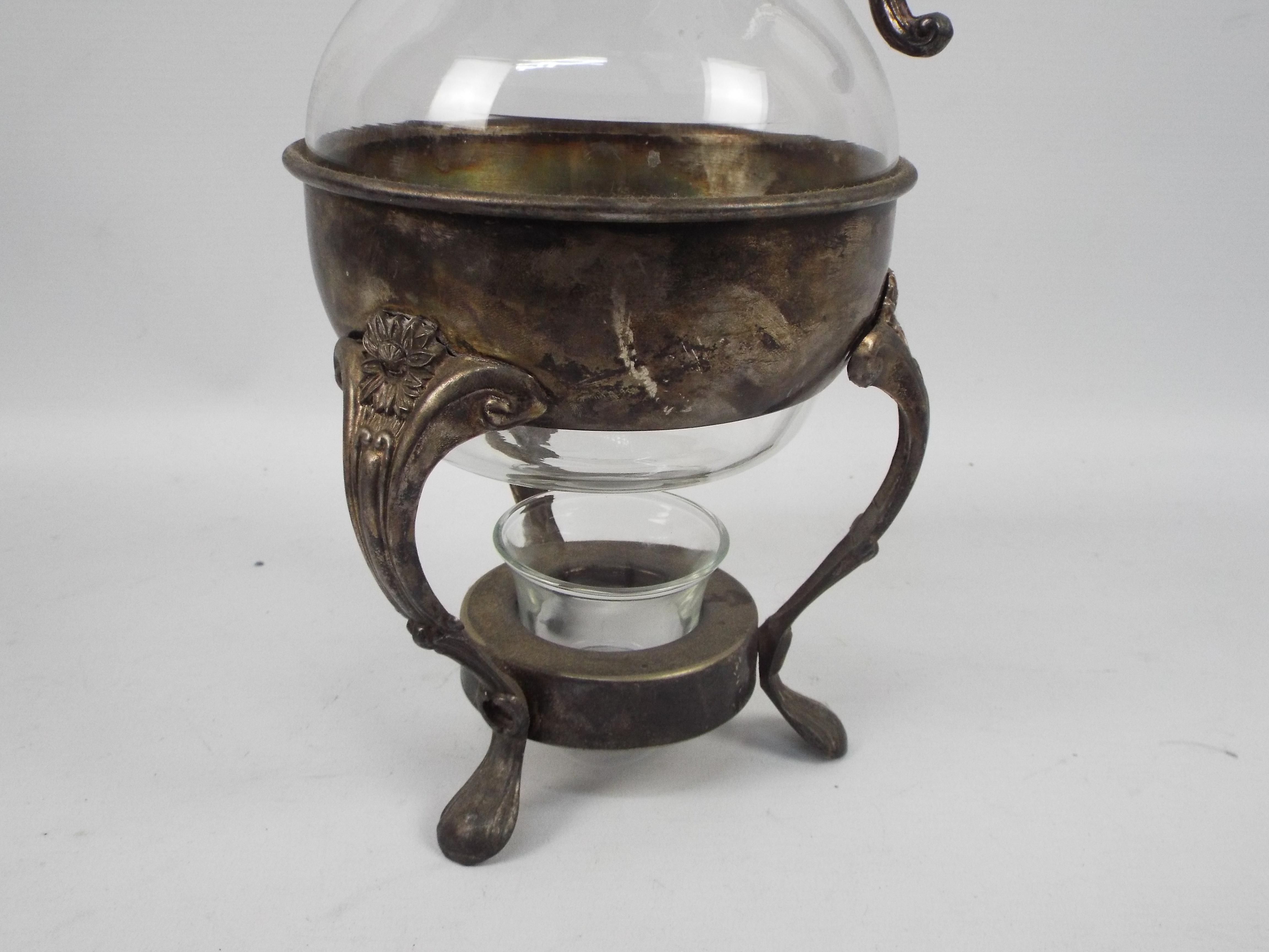 A glass and silver plate coffee pot with plated warming stand, approximately 35 cm (h). - Image 2 of 5