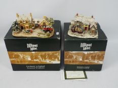 Lilliput Lane - Two boxed Illuminated Cottages models comprising The Wagon & Horses # L2793 and The