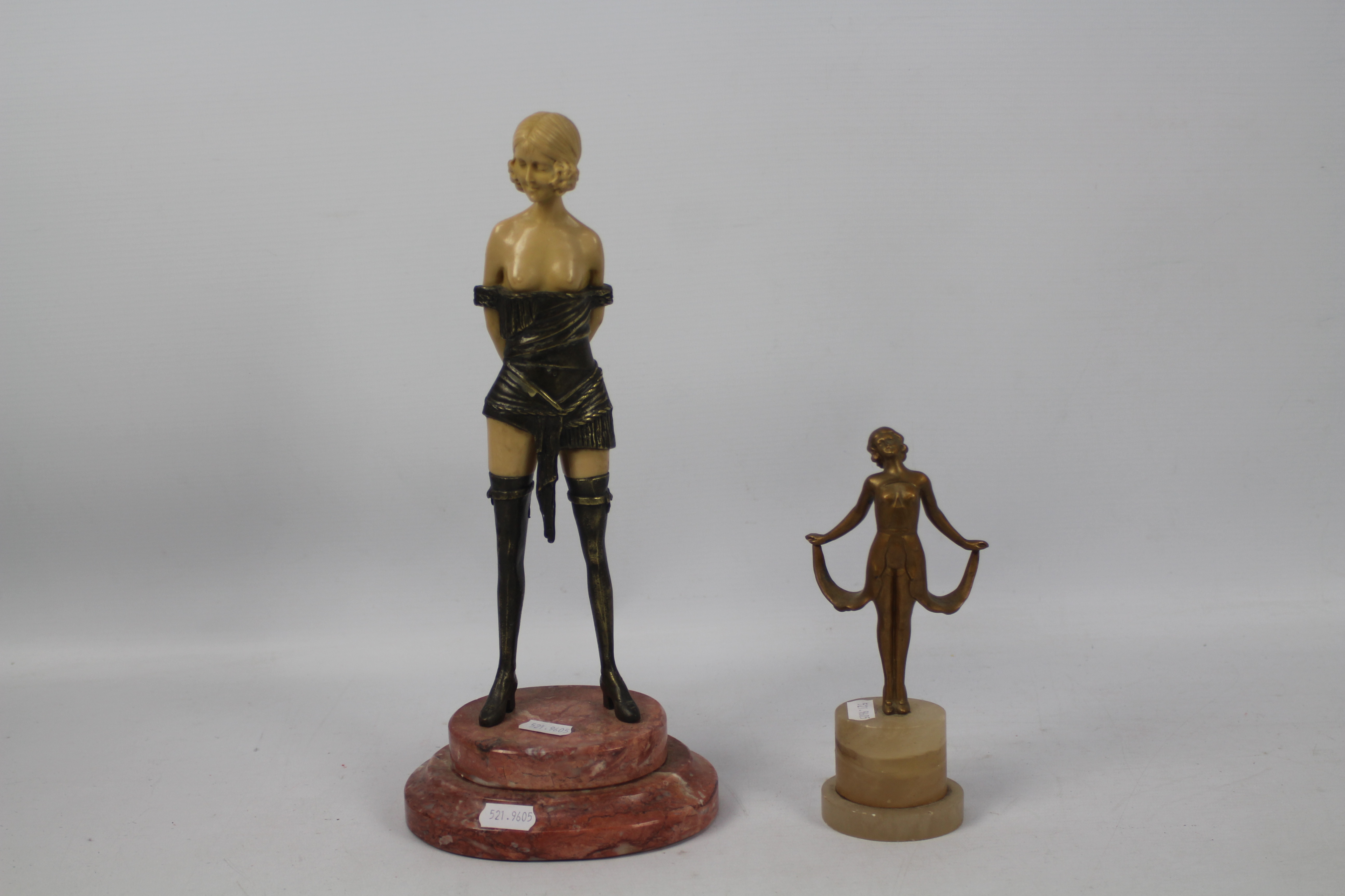 An Art Deco style cast metal and composition figure after Bruno Zach,