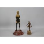 An Art Deco style cast metal and composition figure after Bruno Zach,