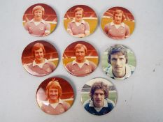 Football Badges, Eight large tin player badges, Manchester City mid-1970s, includes Royle,
