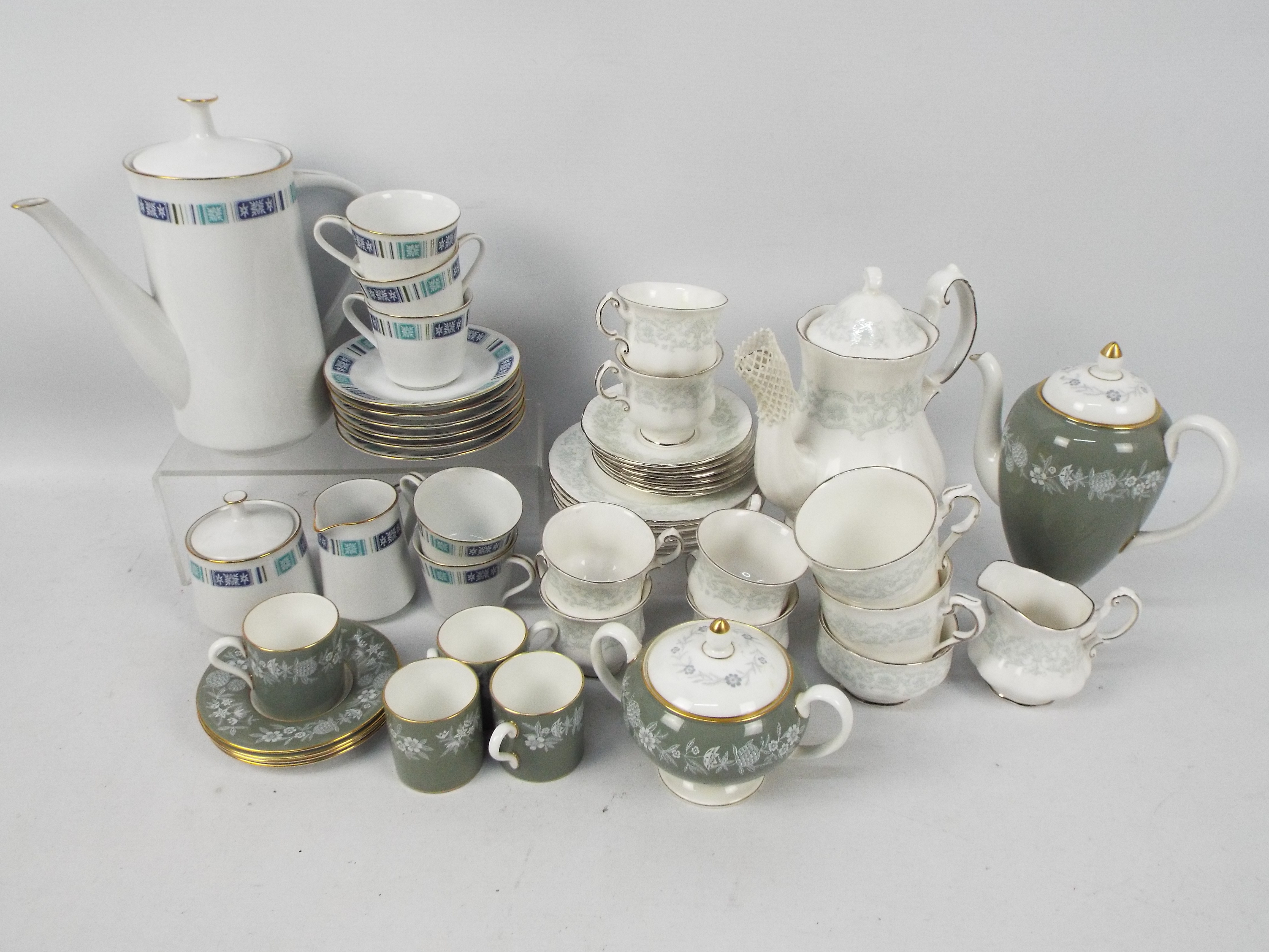 Three coffee services to include a Wedgwood Fieldfare pattern comprising coffee pot, sugar bowl,