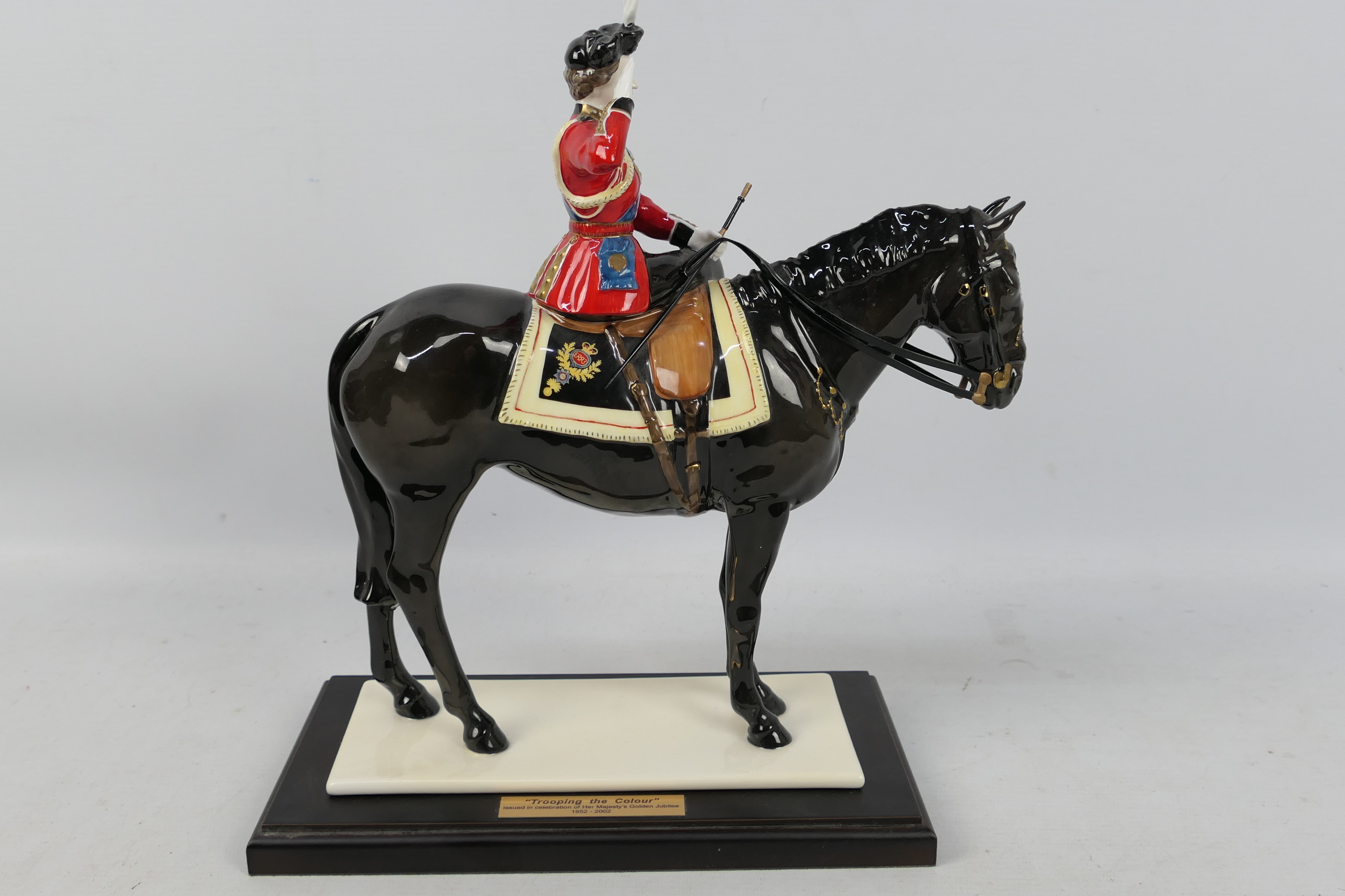 Coalport - Large ceramic figure group of Queen Elizabeth II taking the salute at Trooping the