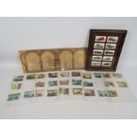 A framed cigarette card display of motor cars,