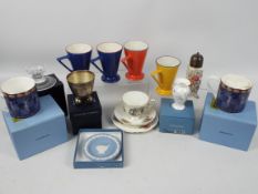 A collection of ceramics and glassware to include Wedgwood, including pieces signed in gold pen,