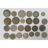 A collection of continental silver and white metal coins to include George III Essequibo & Demerary