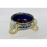 A Doulton Pottery stoneware salt cellar by George Tinworth,