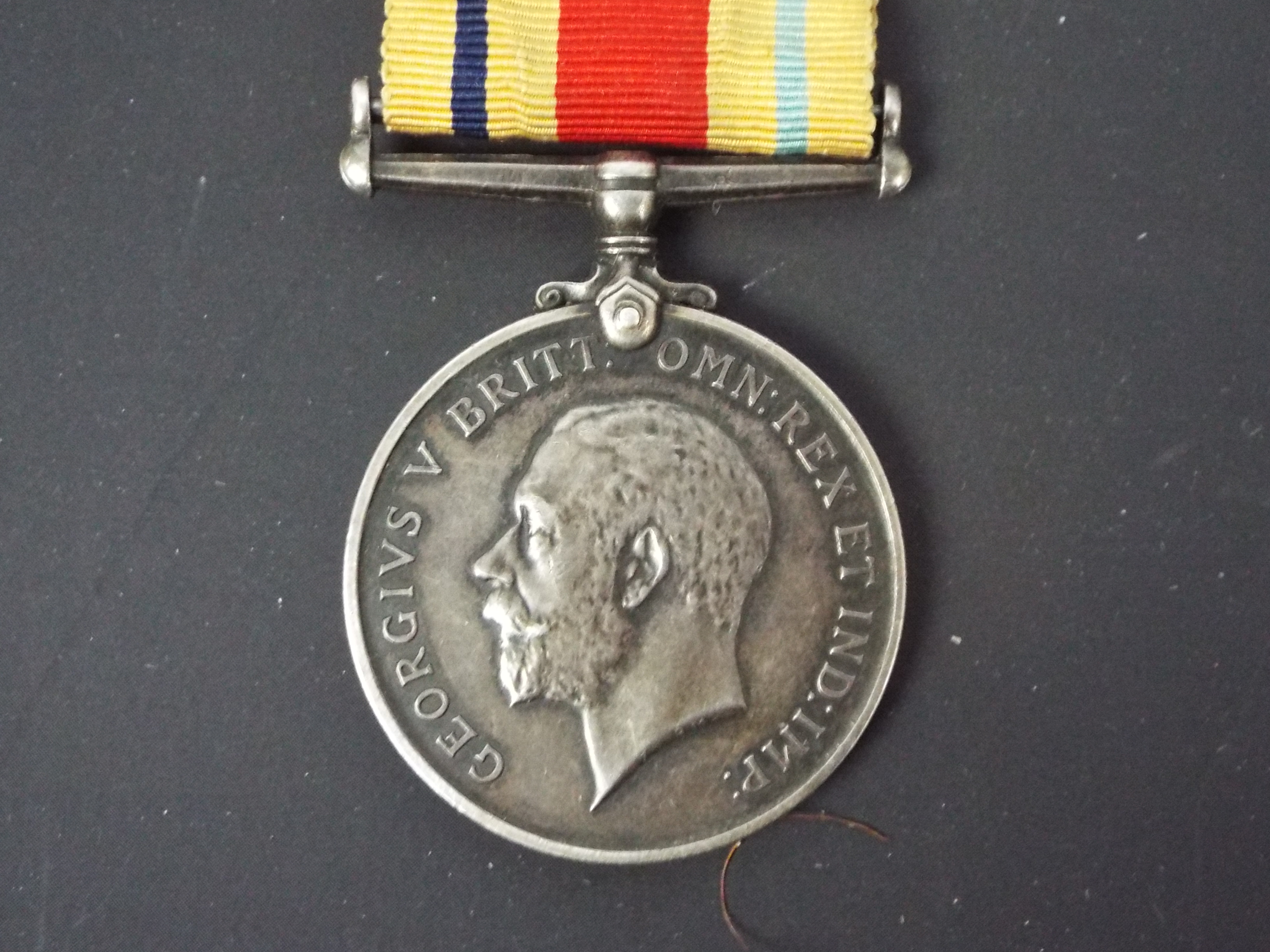 A World War One (WW1 / WWI) British War Medal with associated Africa Star ribbon, - Image 2 of 10