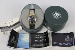 A gentleman’s Citizen Ecodrive wristwatch in original box with paperwork.