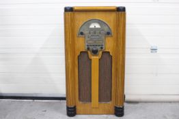An Omega Collectors Edition, vintage style radio, approximately 94 cm x 51 cm x 28 cm.