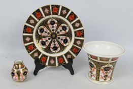 Royal Crown Derby - Three pieces of Old Imari pattern ceramics to include a 9" diameter plate,