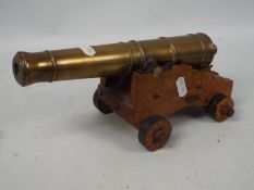 Cannon - A 20th century engineers scale model of an early 19th century naval cannon,