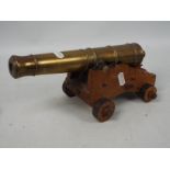 Cannon - A 20th century engineers scale model of an early 19th century naval cannon,