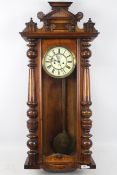 A Vienna-style weight-driven striking wall clock by Gustav Becker,
