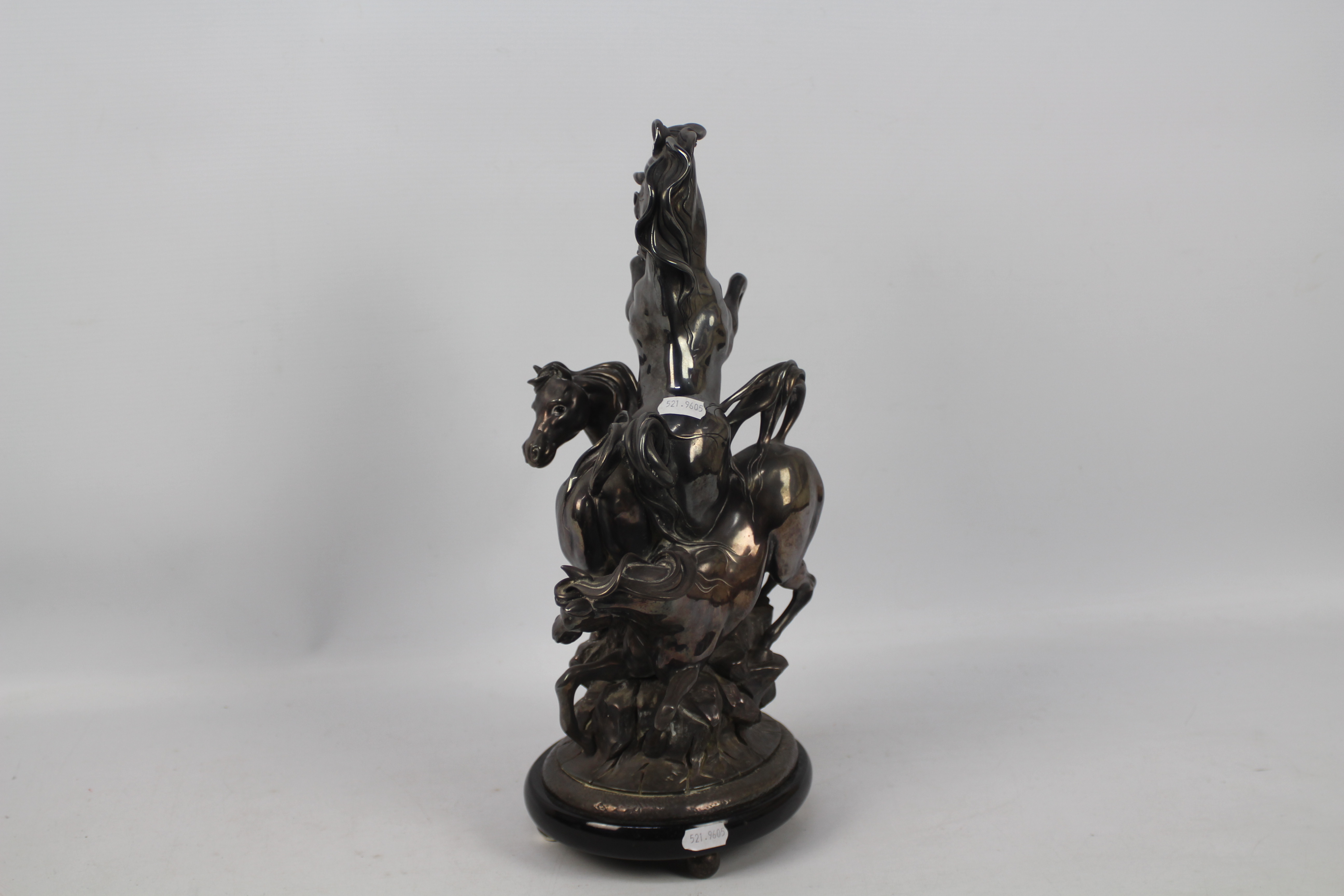 Ottaviani (Italian), 20th century - A silvered sculpture of three horses surmounting a rock, - Image 4 of 7