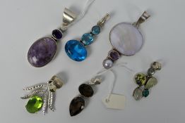 Six white metal, stone set pendants, predominantly stamped 925.