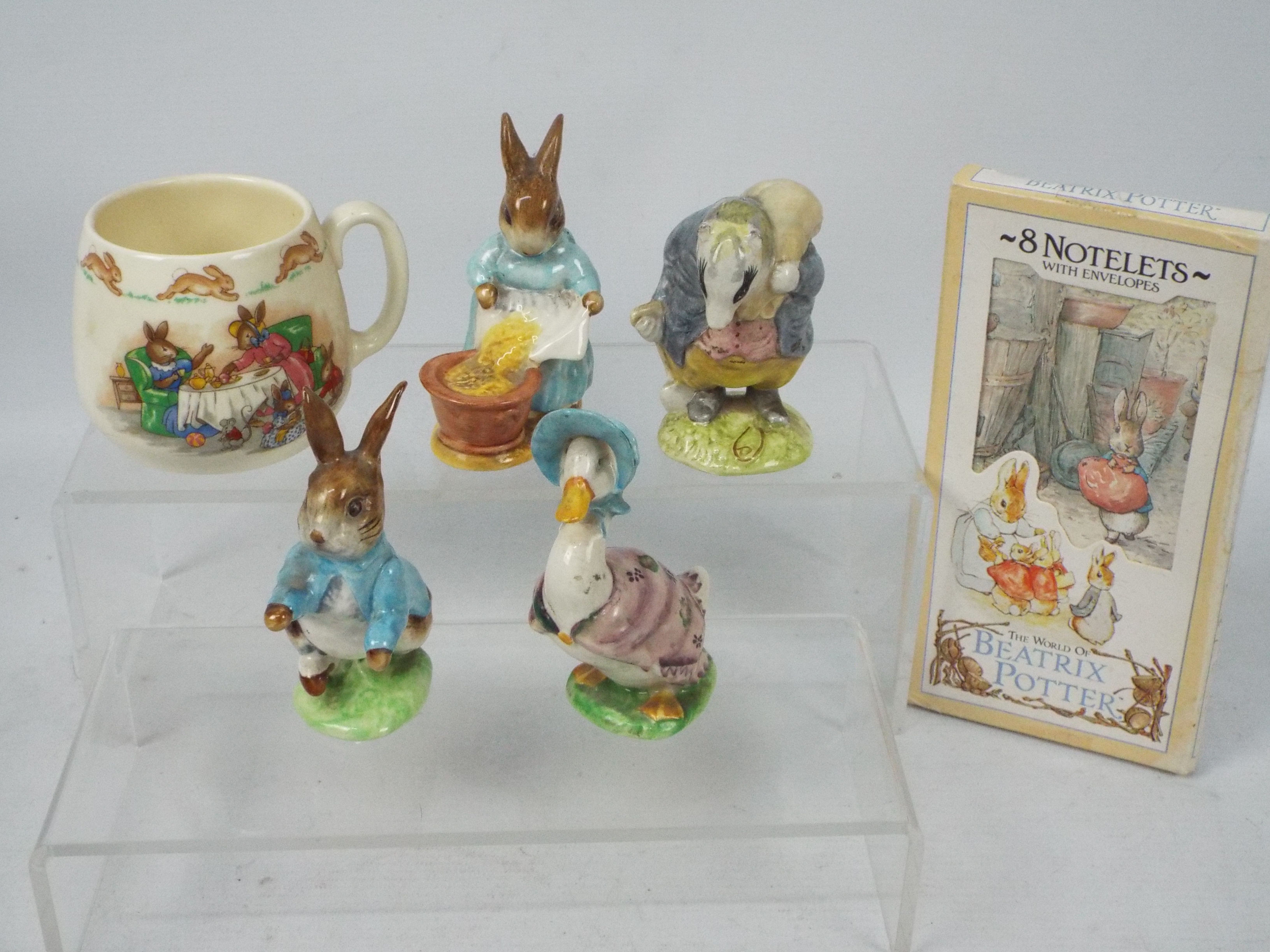 Four Beswick Beatrix Potter figures, a Bunnykins mug and other.