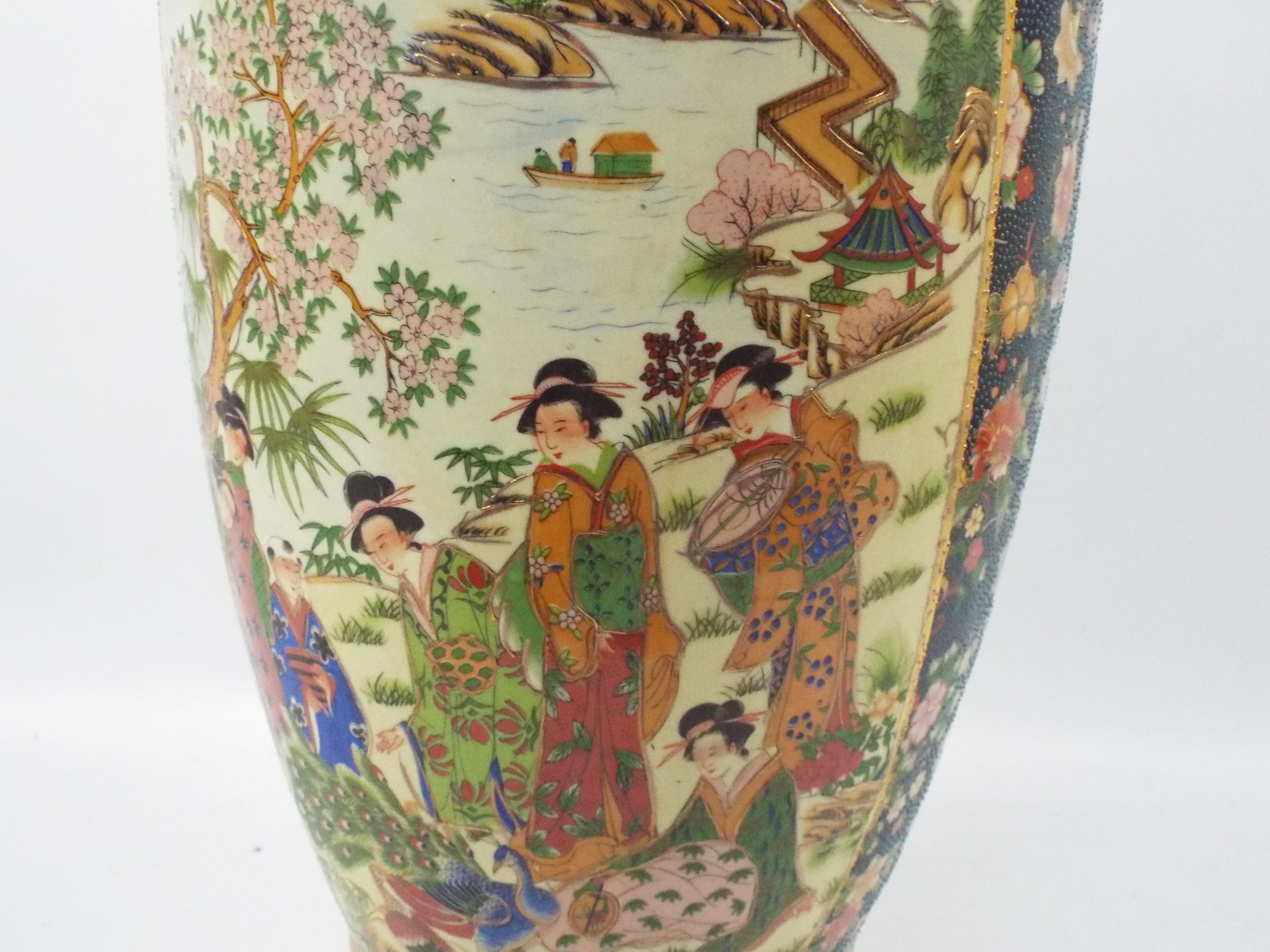 A large Japanese Satsuma ware vase with twin gilt handles decorated with two panels of figures in a - Image 4 of 10