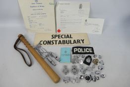 Two police whistles comprising a J Hudson Birmingham example and an Adie Bros Birmingham,
