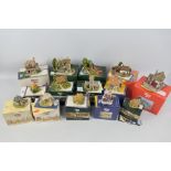 Fourteen boxed Lilliput Lane models to include Traveller's Rest, Cowslip Cottage,