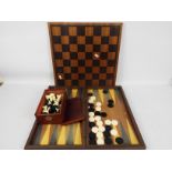 A chess set and board, king approximately 9 cm (h) and a folding backgammon board.