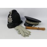 A vintage Warrington Borough Police helmet,