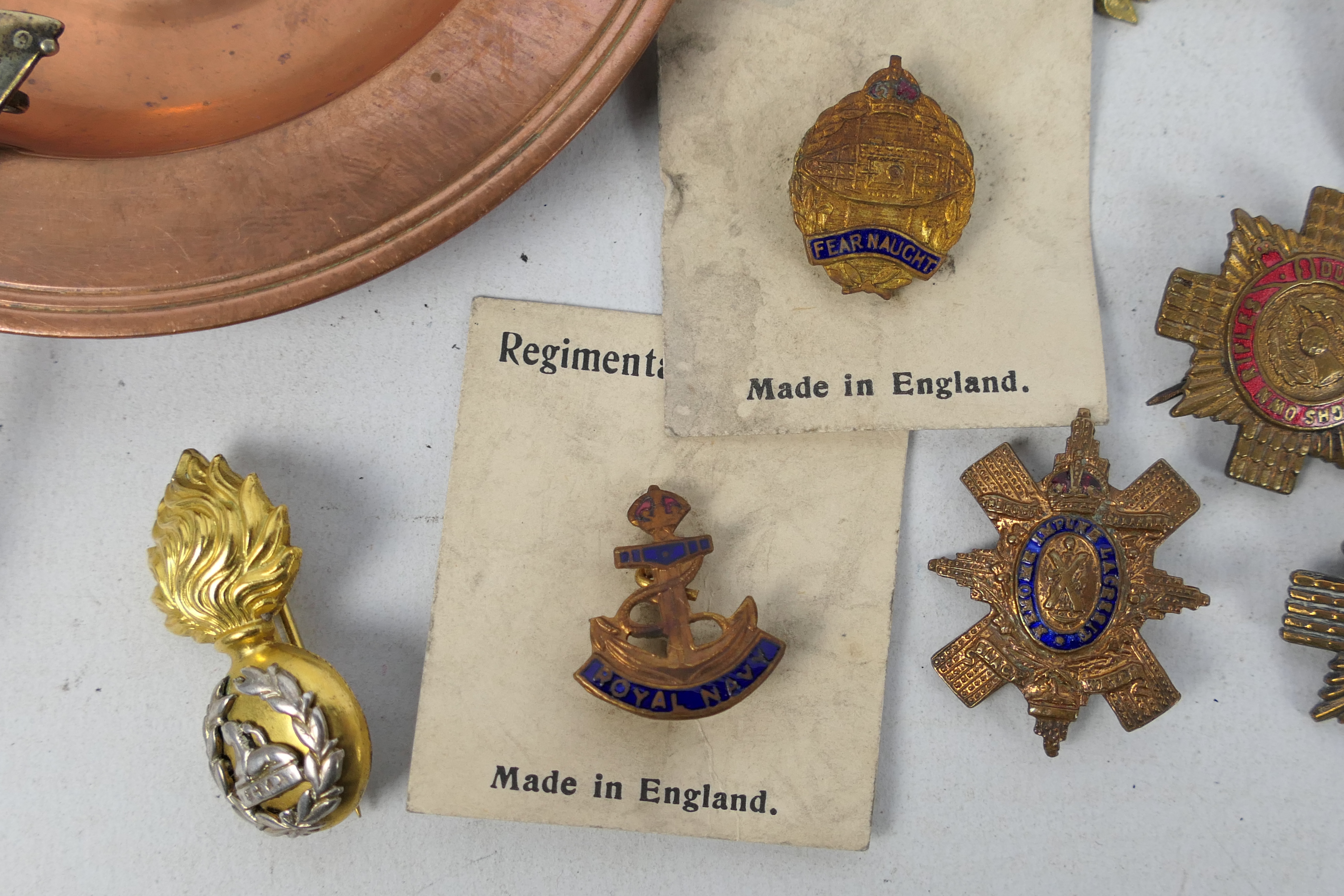 A collection of sweetheart brooches and similar and a copper dish with applied Metropolitan Special - Image 5 of 5