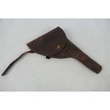 A Boer war style leather pistol holster.