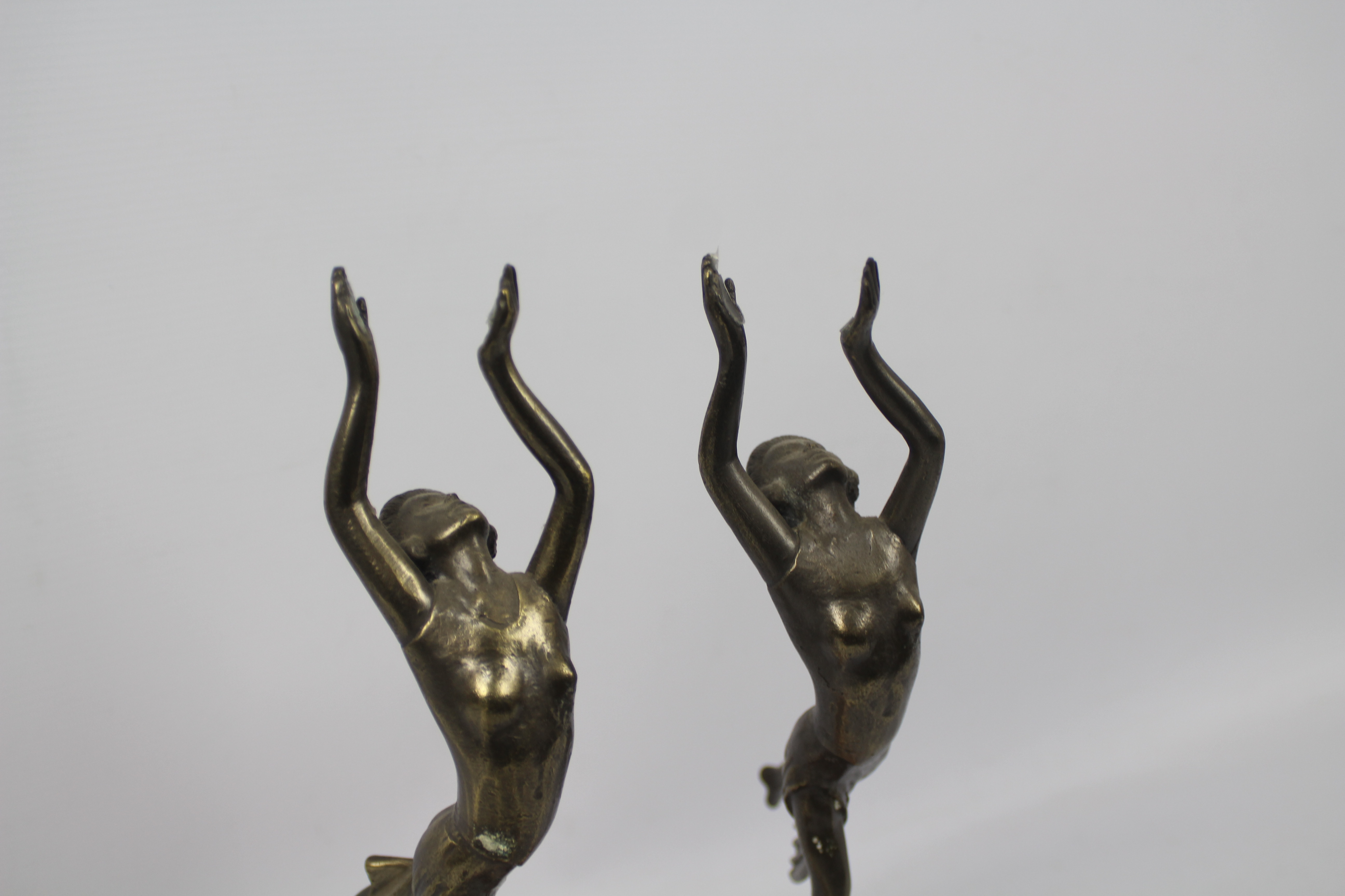A pair of Art Deco style sculptures modelled as female figures holding aloft spheres, - Image 6 of 6