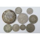 A collection of silver and white metal coins to include US 3 Cents (1852 and 1865), Egypt: 10 Qirsh,